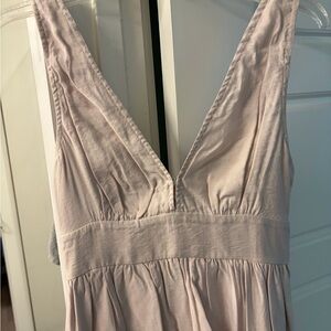 These three boutique Light Mauve V-Neck Sleeveless top